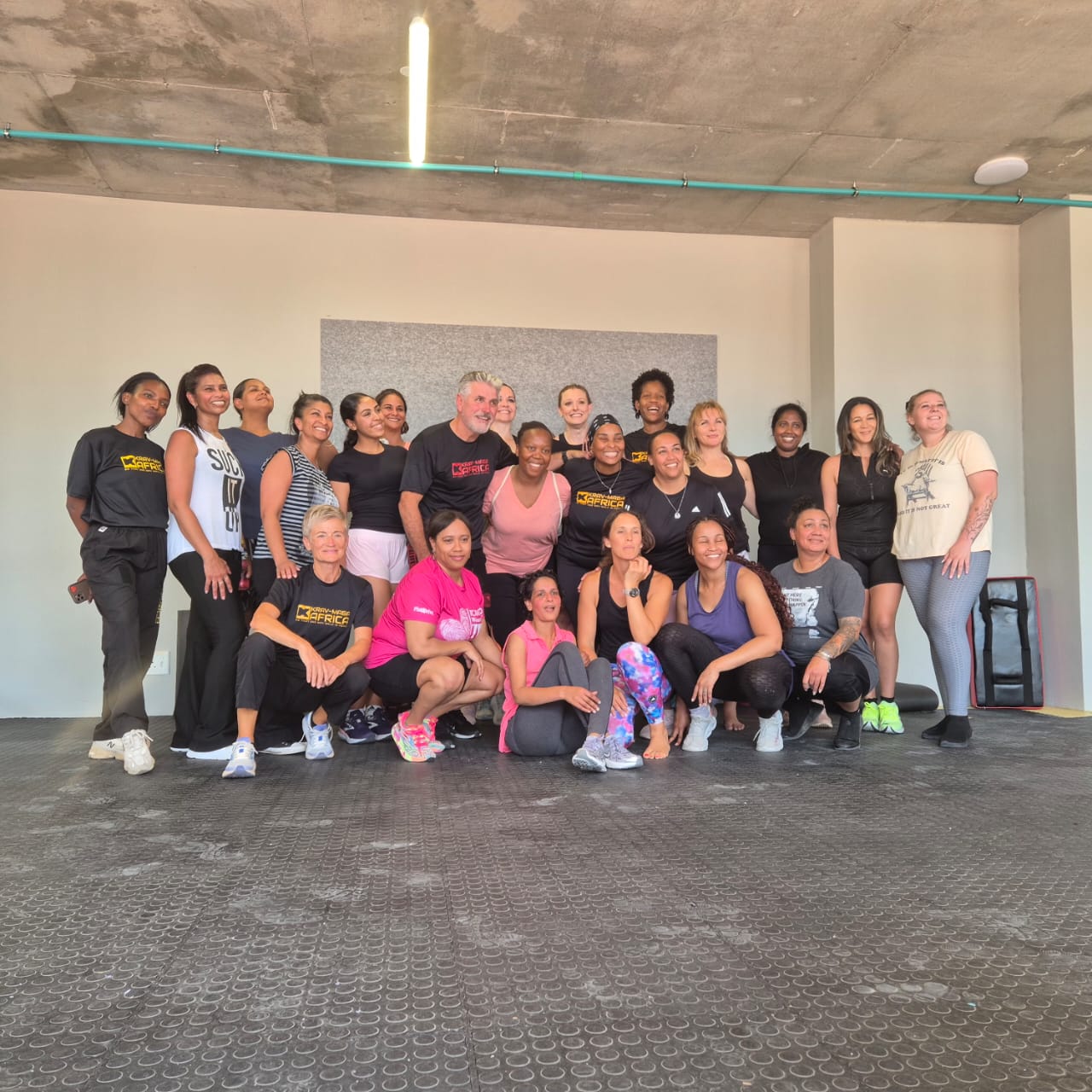 DefendHer group photo after the session