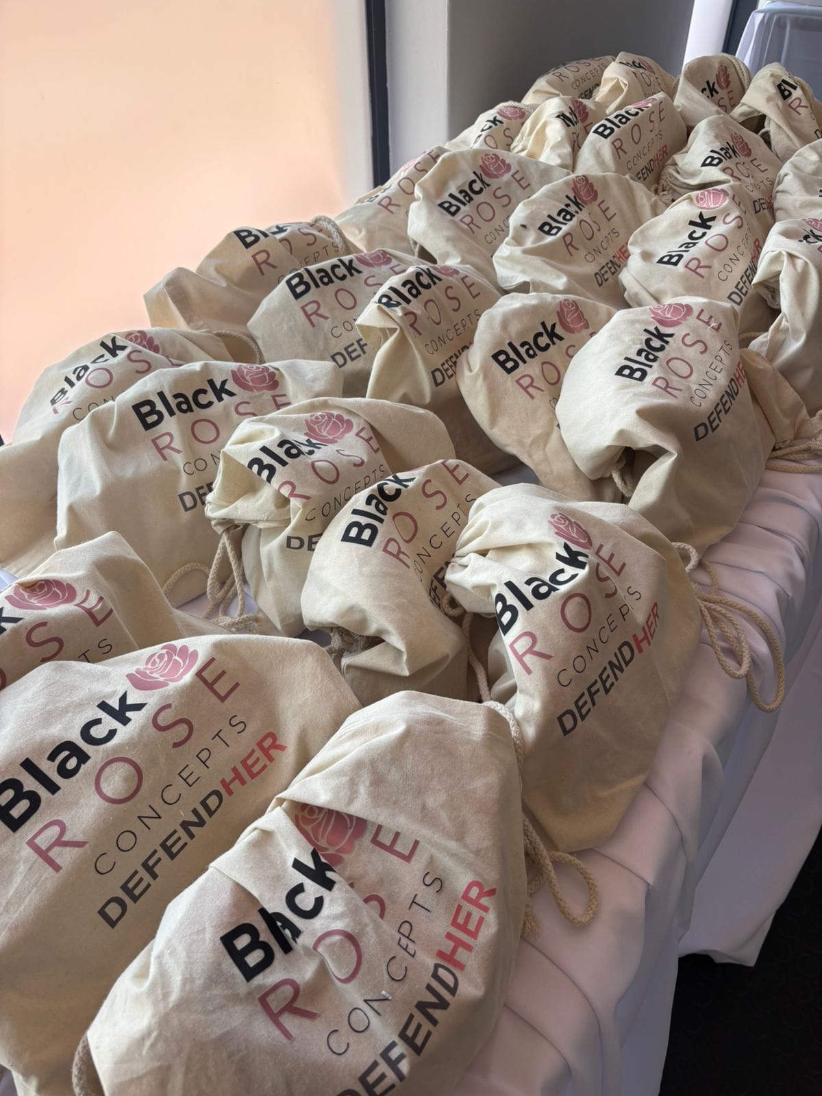 Black Rose Concepts and DefendHer branded gift bags